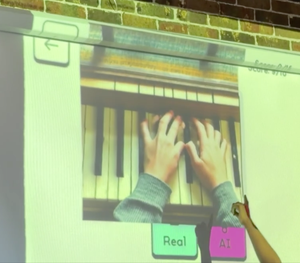 Students playing Real or AI